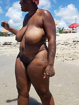 black girl vacant beach tease